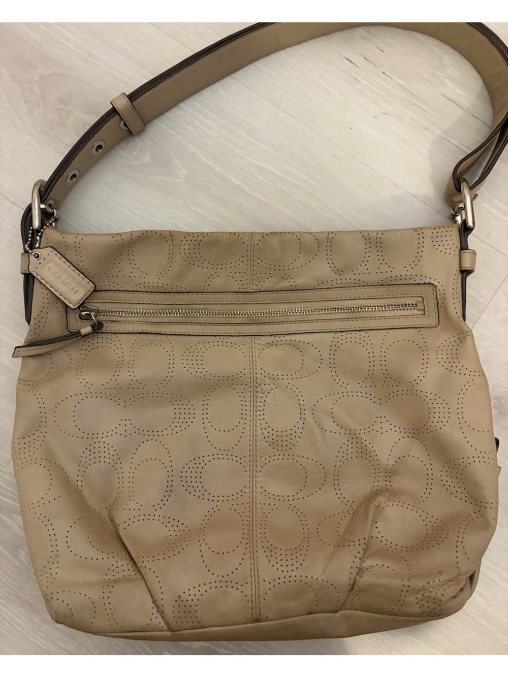 2000s Coach Signature Perforated Leather North South Duffle in color Sand/Tan